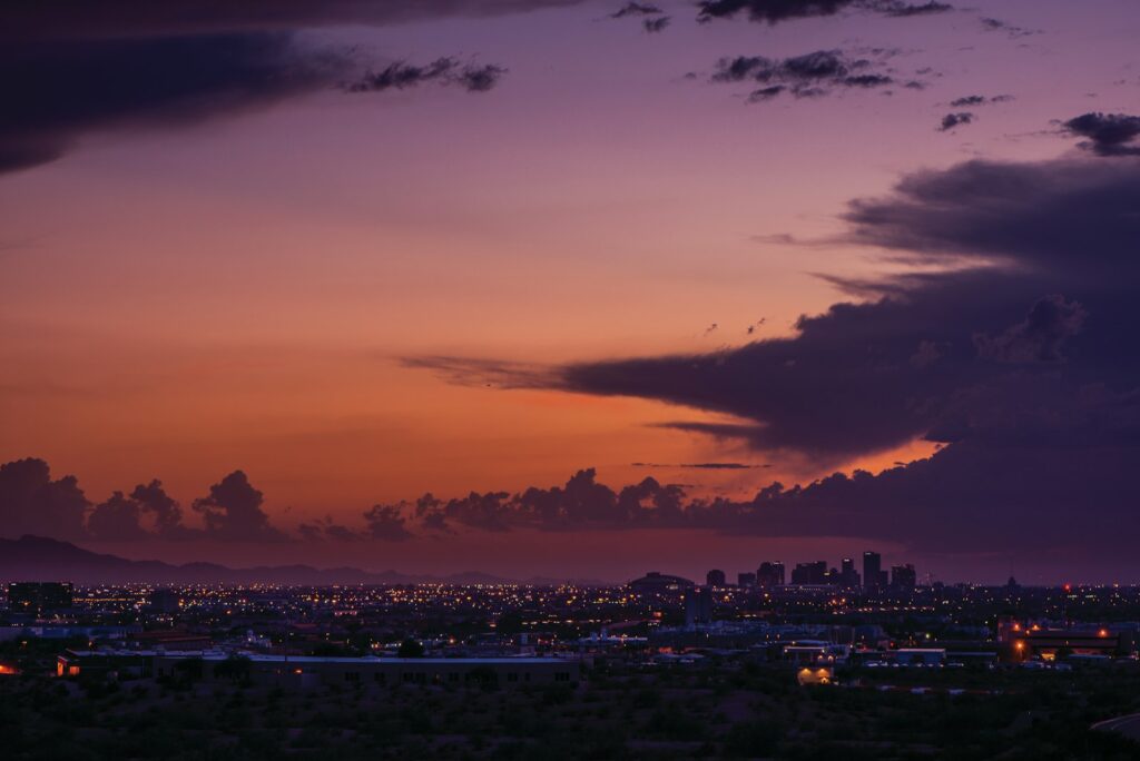 Phoenix Arizona skyline and mountains at sunset